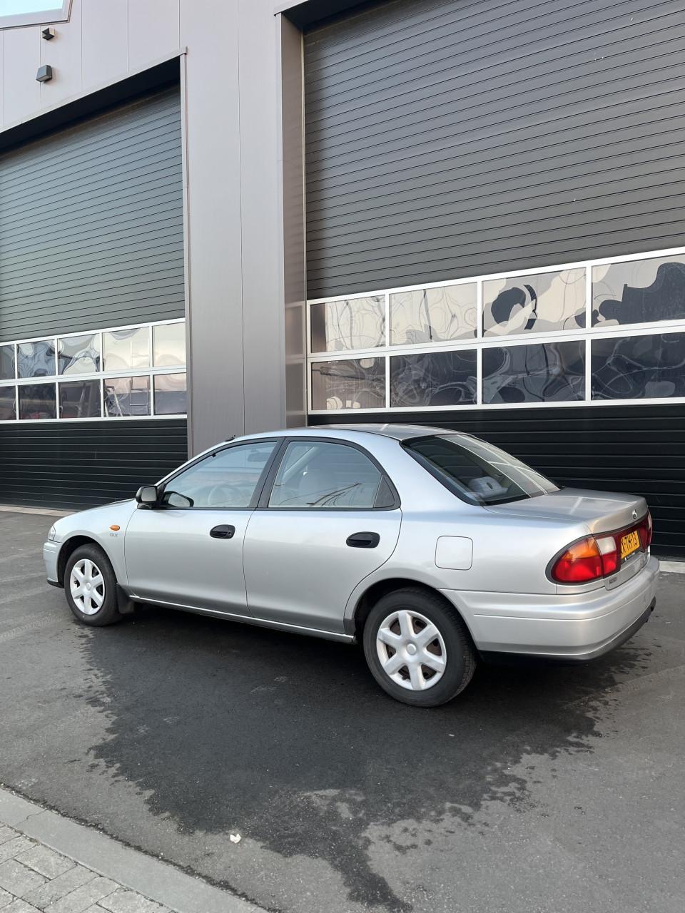 Mazda 323 1.5 SDN LX 1997 Grijs