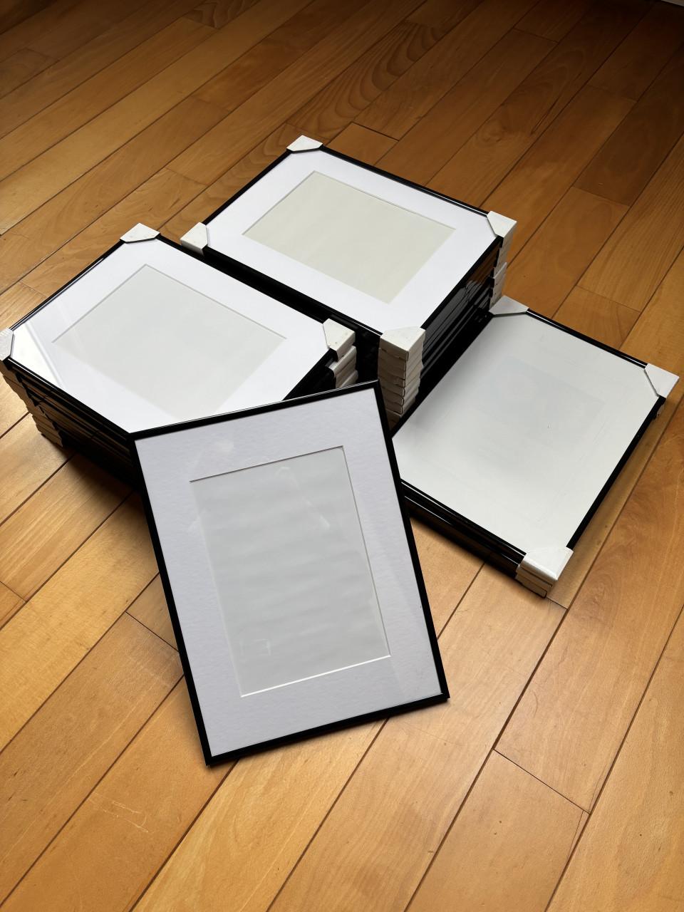 Fotolijsten ( zwart ) met passe-partout ( wit )