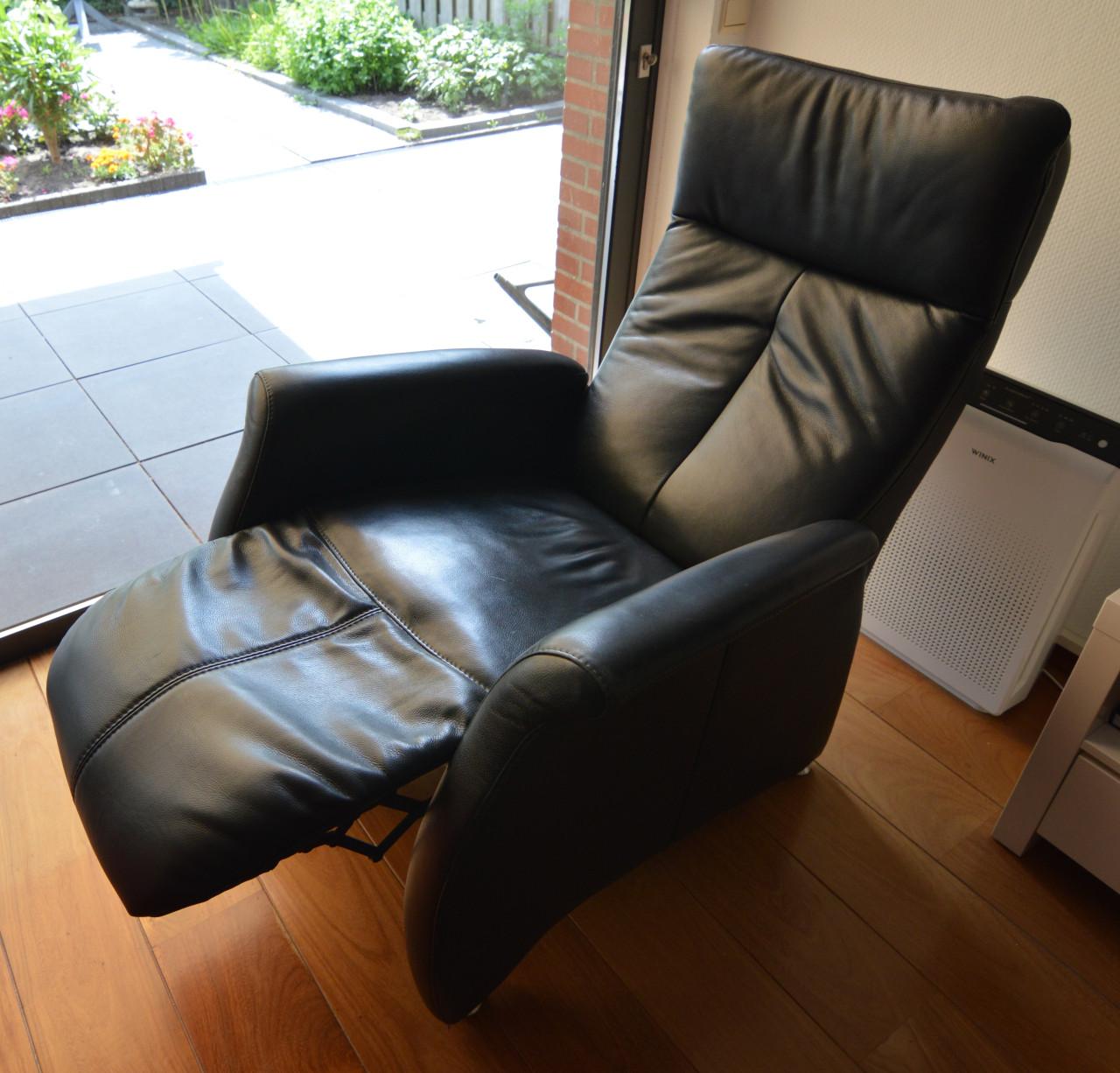 Uitklapbare lederen fauteuil