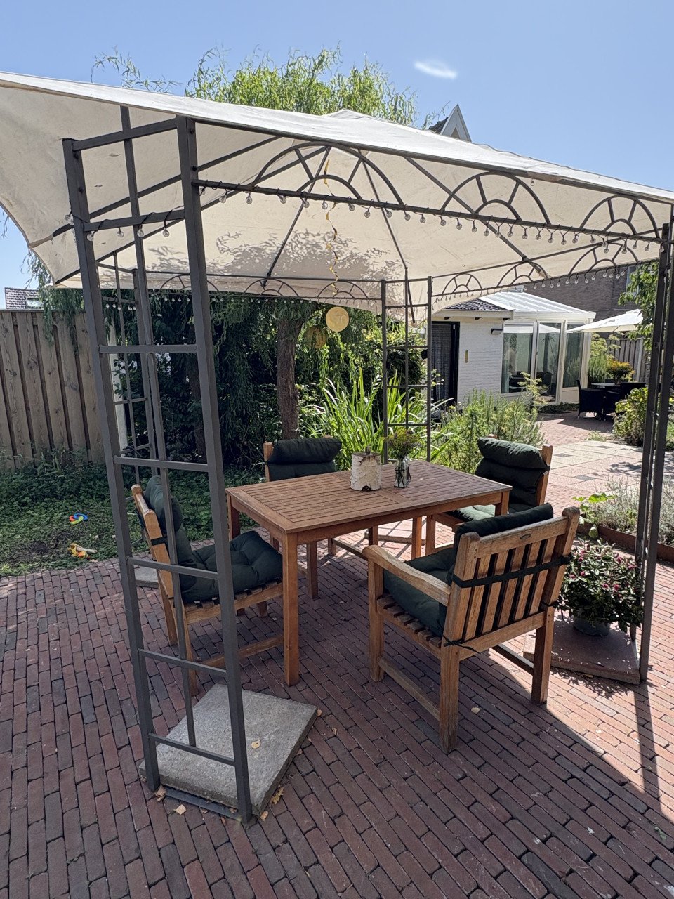 4 teakhouten tuinstoelen met kussens