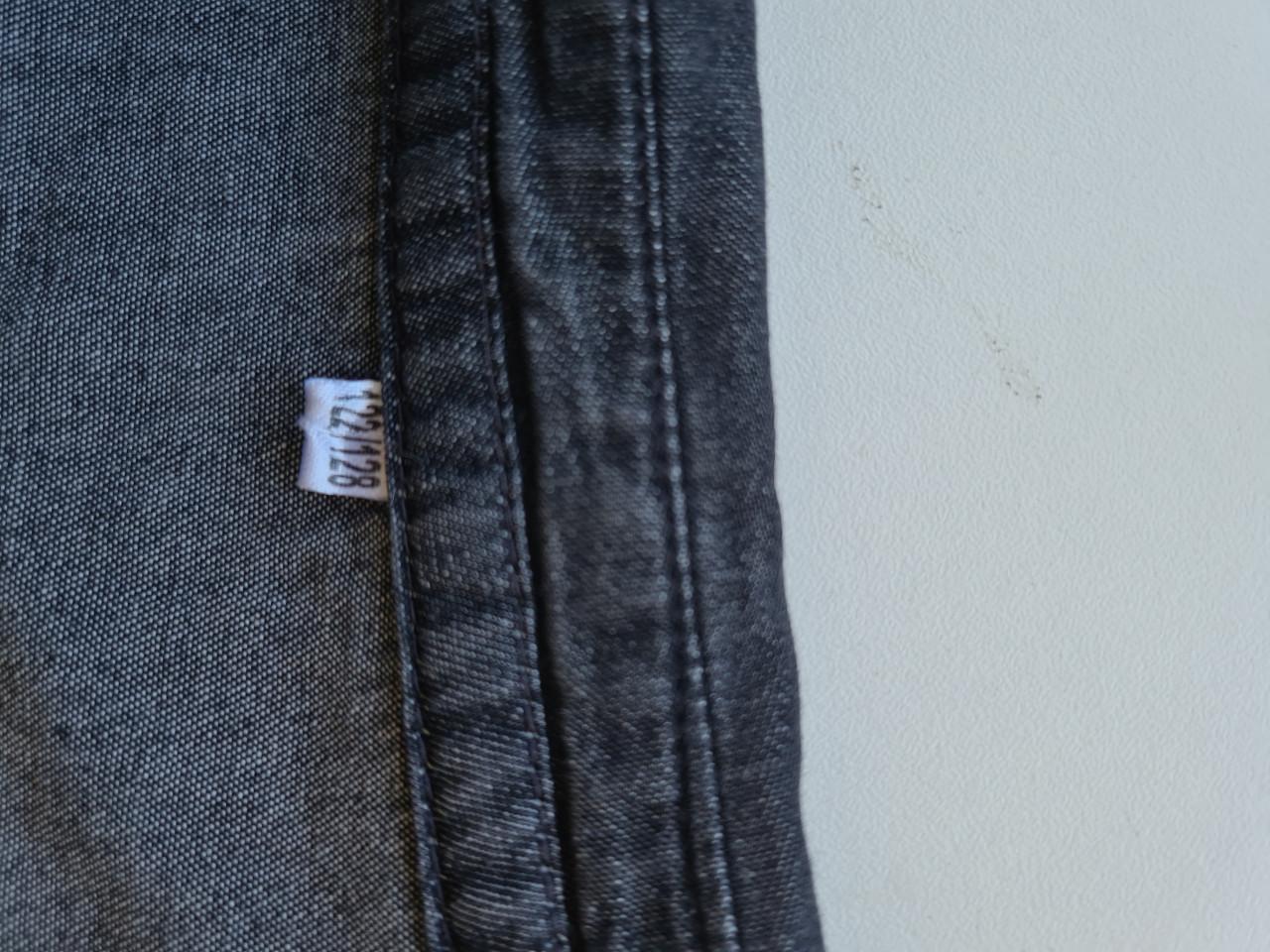 Zwart wijd spijkerstof jurkje van Zeeman Mt 122-128