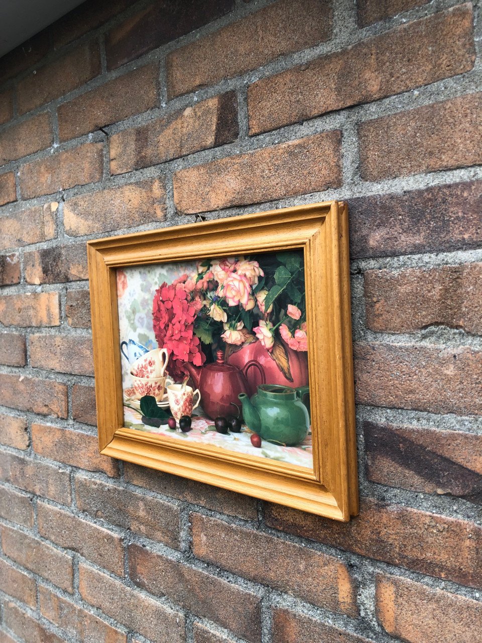 Mooie print in gelijst achter glas.