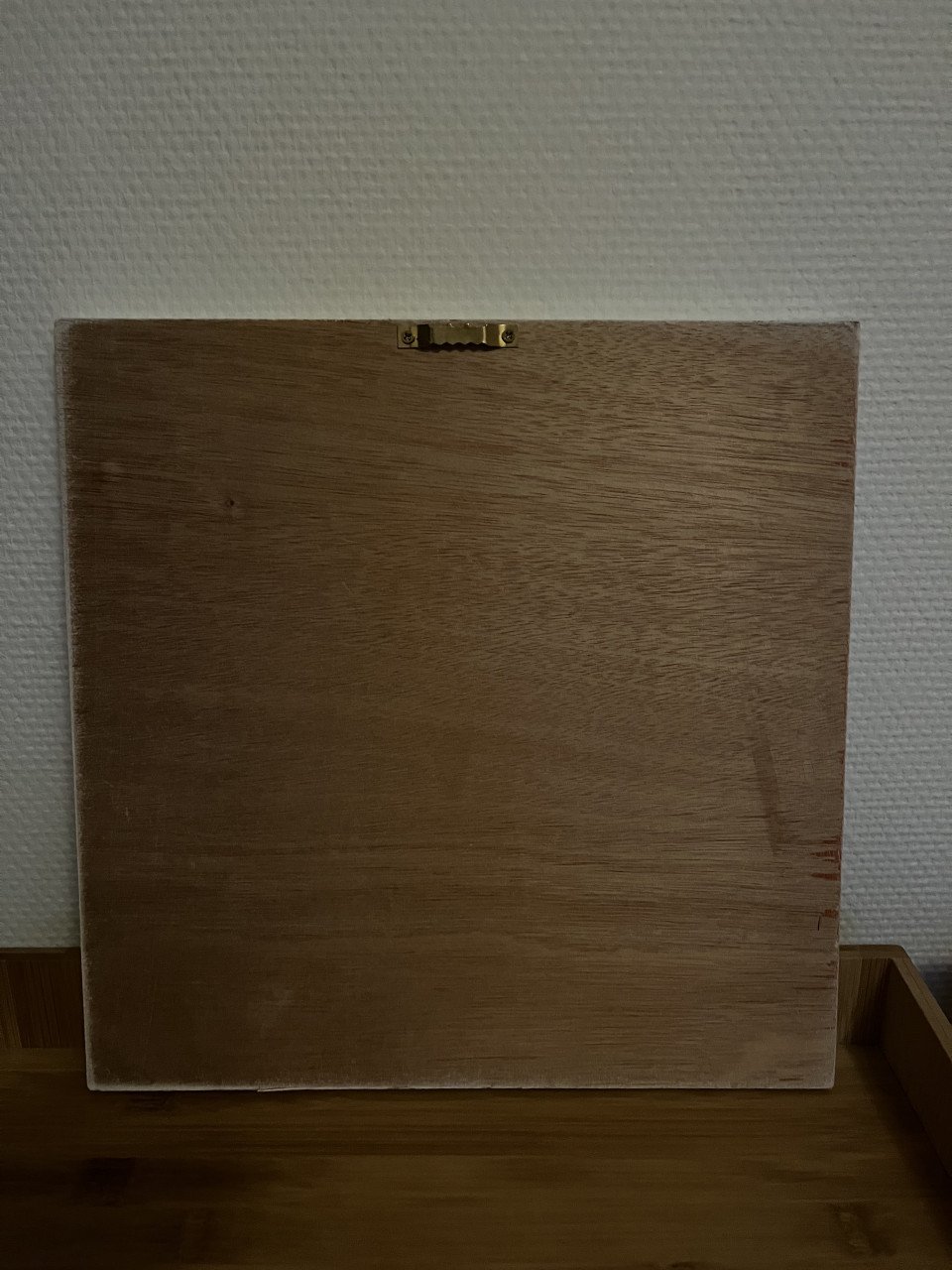 Houten plaat met koe