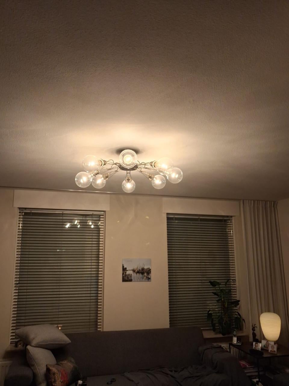 Een design plafondlamp te koop aangeboden