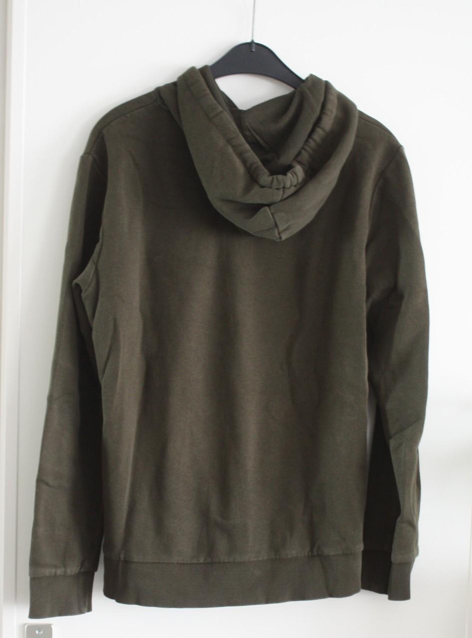 Donkergroene trui maat m