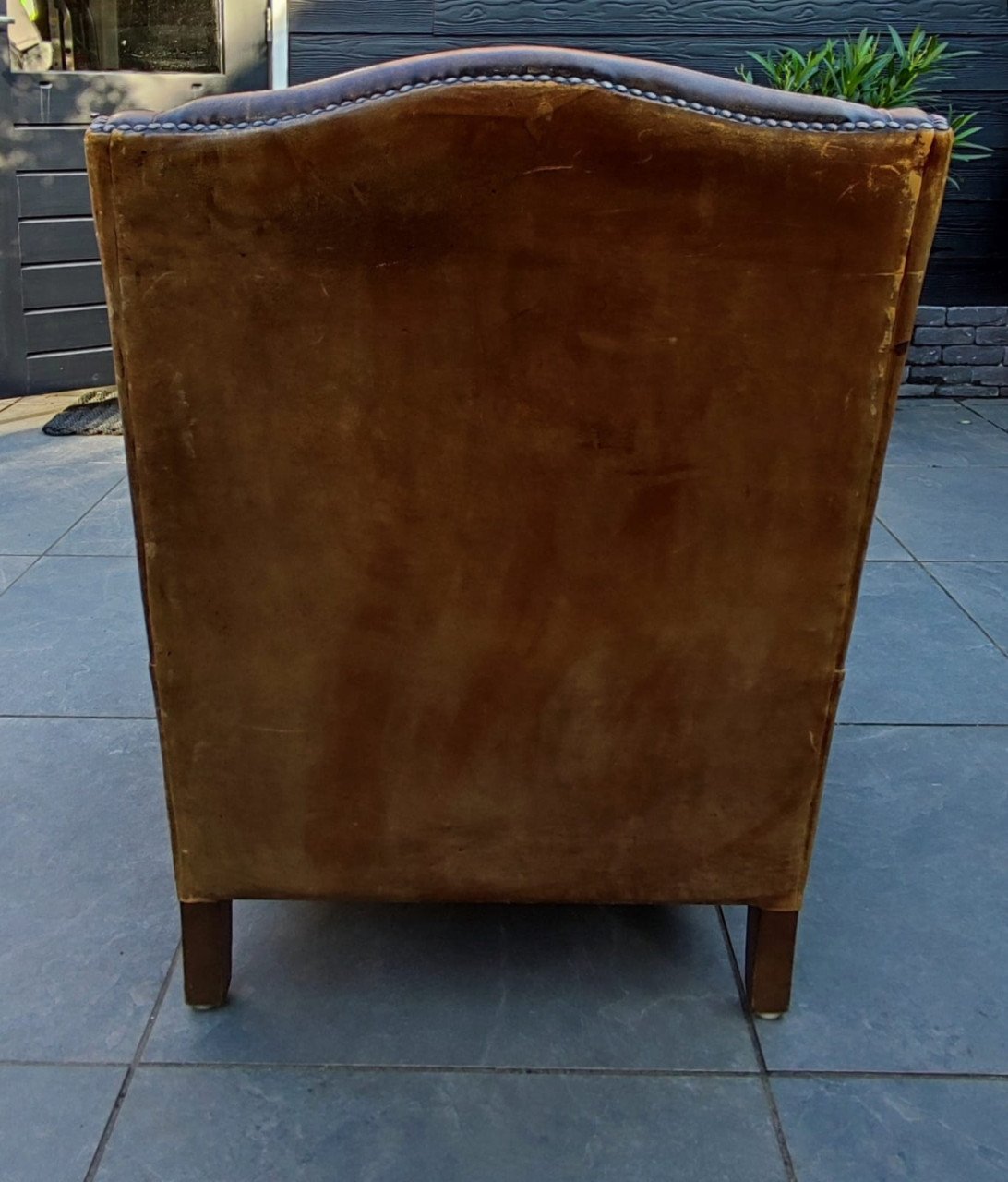 Antieke schapenleren fauteuil