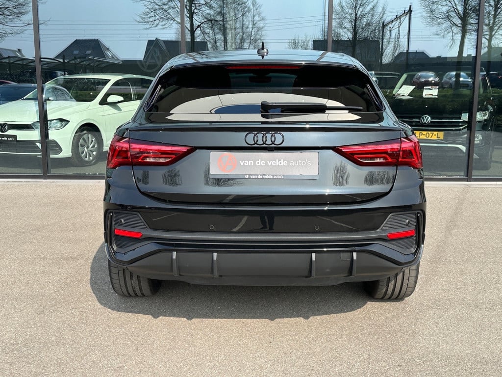 Audi Q3 sportback 45 tfsi e s-line | zwart optiek | camera | keyless | adap