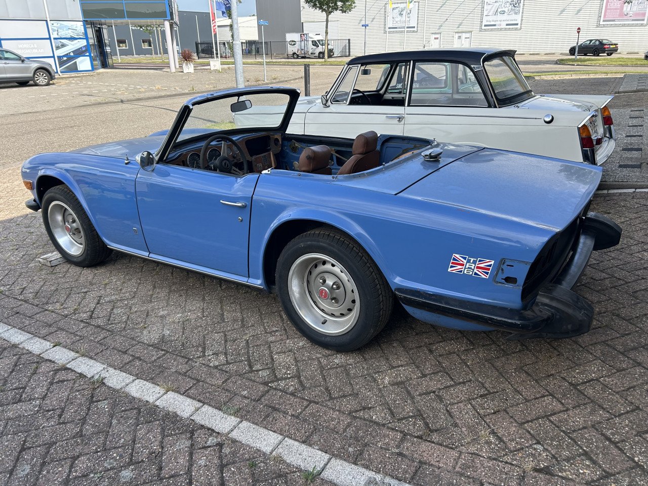 Triumph Herald 1965 en TR6 1973