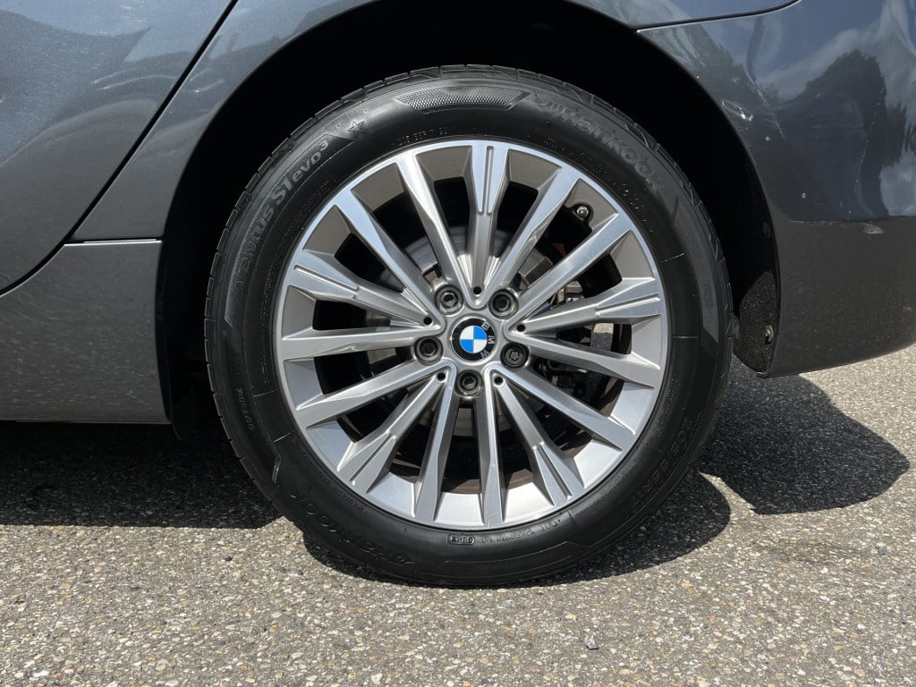BMW 2-serie active tourer 220i high executive | head-up | navi | camera | l