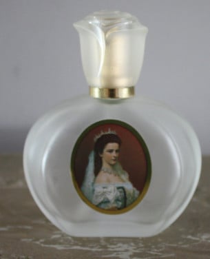 Leeg parfumflesje met foto van sissi