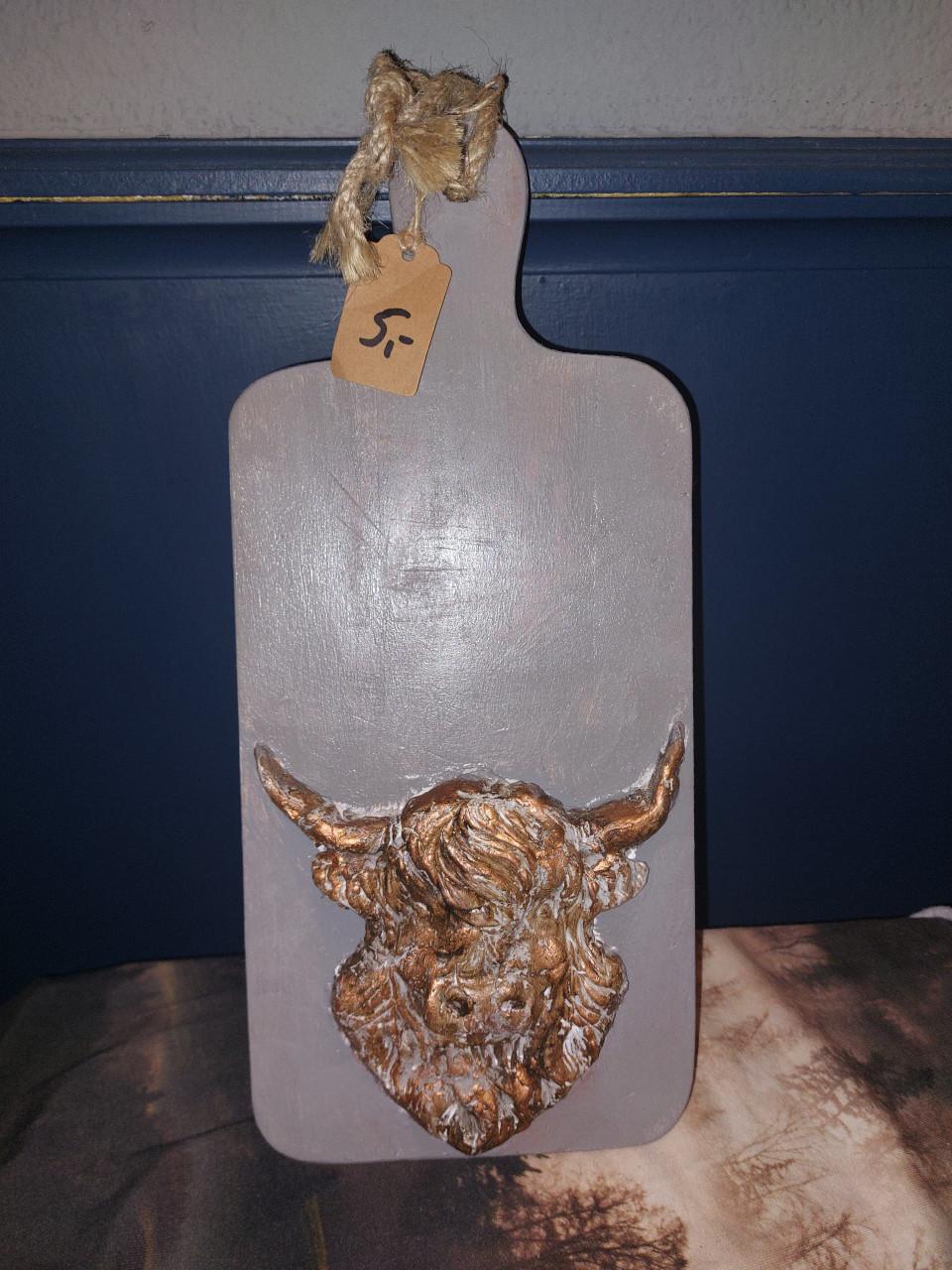 Plankje met schotse hooglander