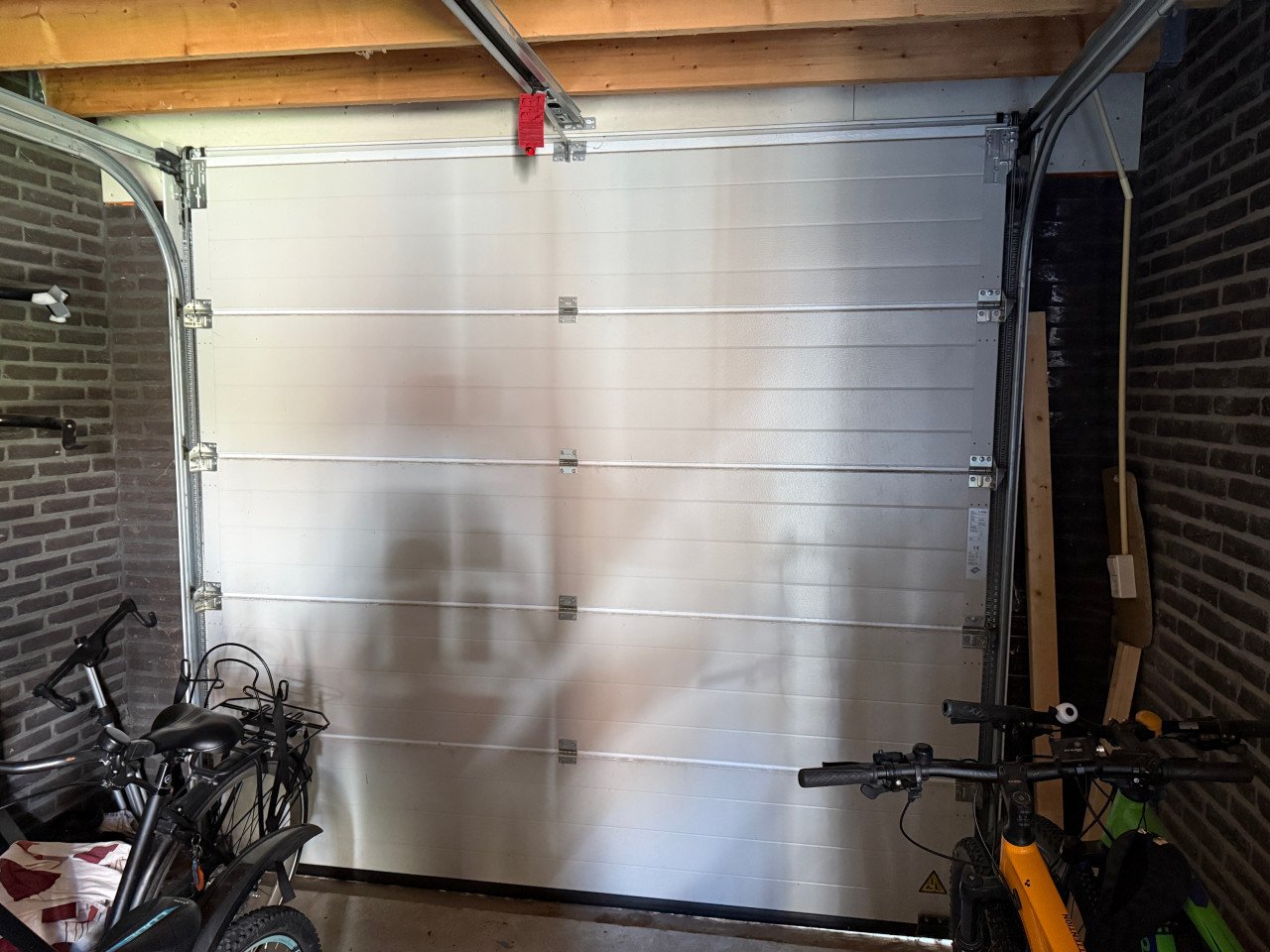 Garagedeur elektrisch sectionaaldeur