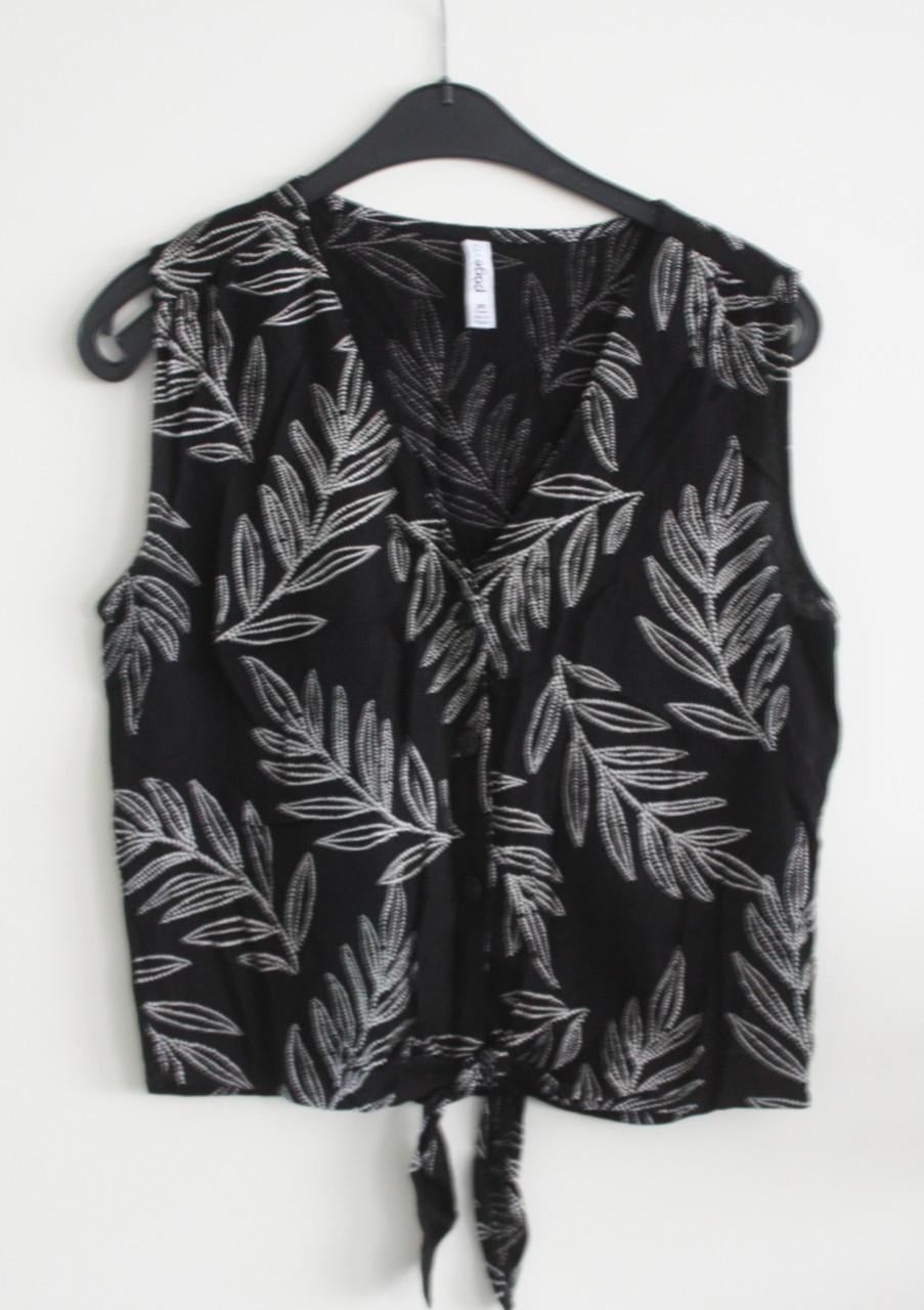 Zwart met wit patroon blousje met knopen 38