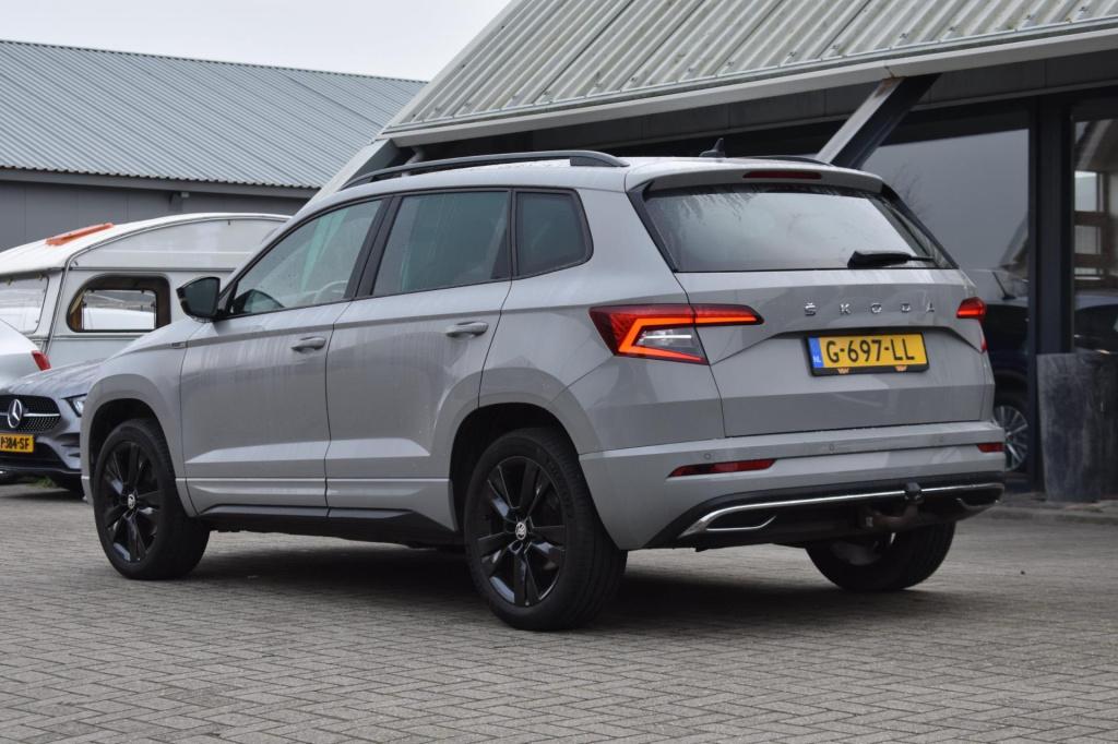 Skoda Karoq 1.5 tsi act sportline | trekhaak | camera | nap | canton | appl
