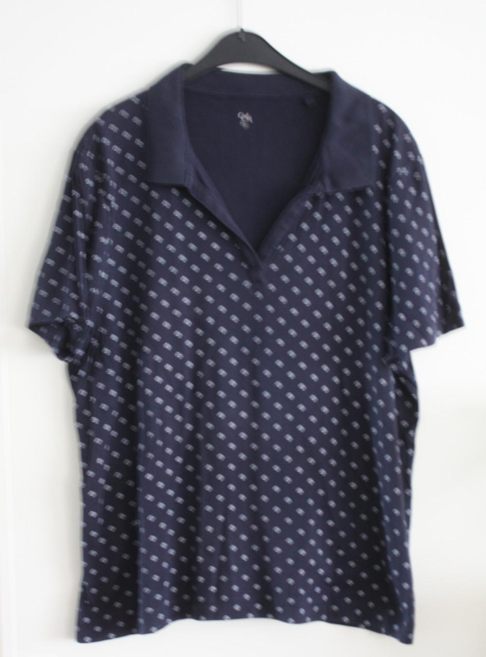 Donkerblauwe polo met witte bloemen print  maat xxl