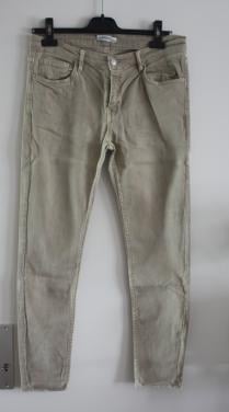 Beige spijkerbroek met rafelrand  spijkerbroek maat 42