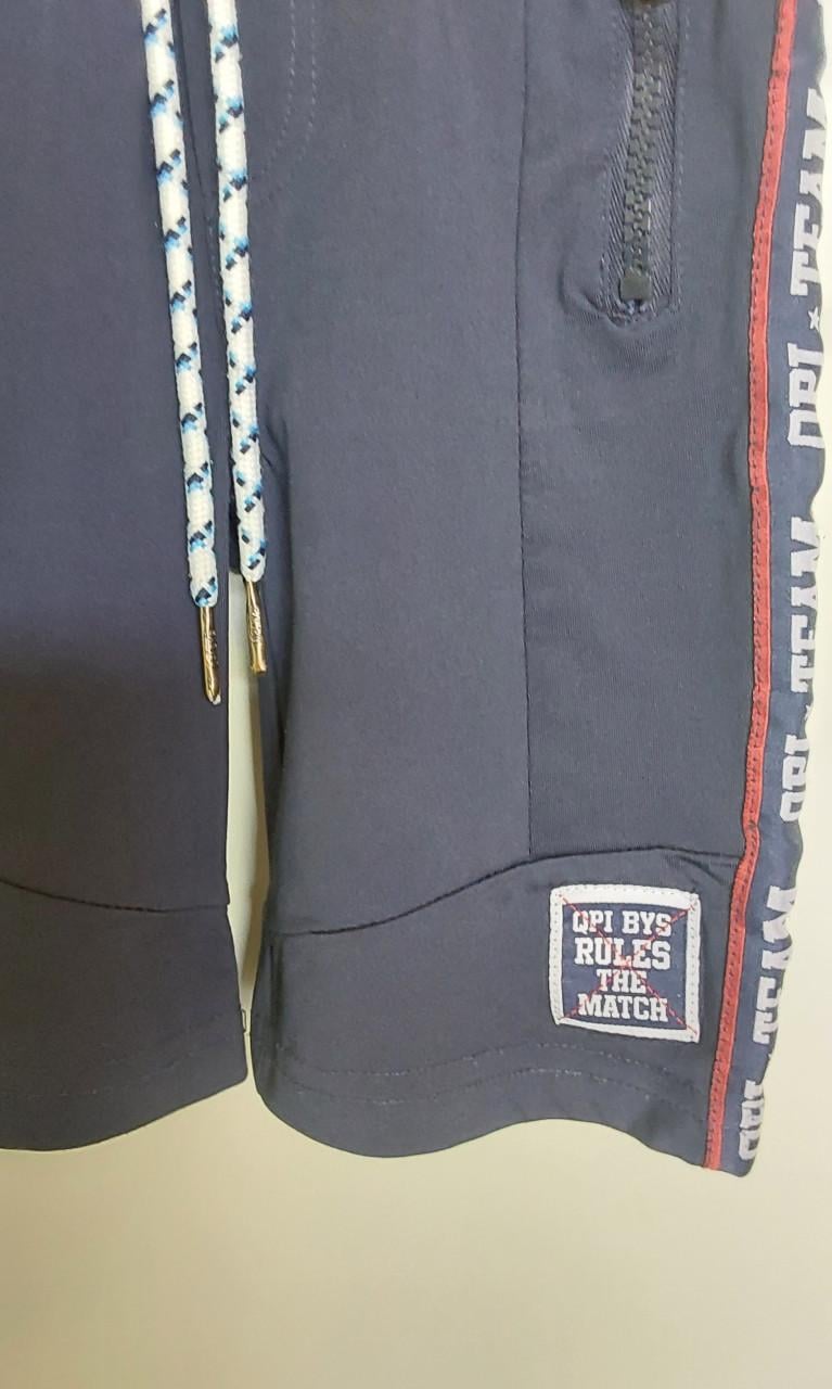 Donkerblauwe korte broek van het merk Quapi boys in maat 92.