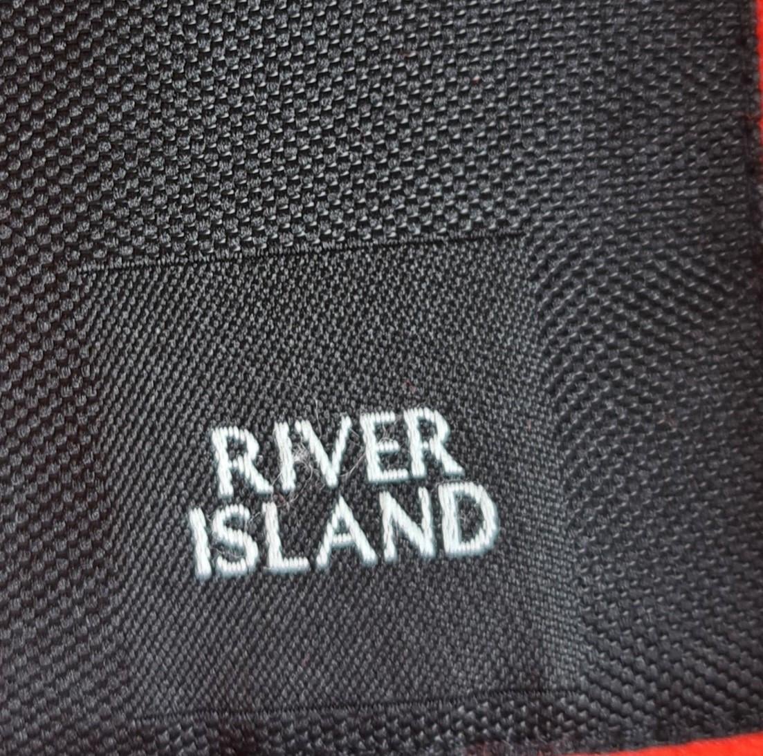 Mooie lange rode jas van River Island met een klassieke dubbele rij knopen