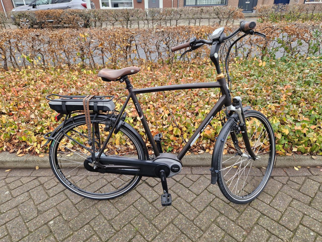 Keurig nette Batavus elektrische heren fiets met Bosch middenmotor