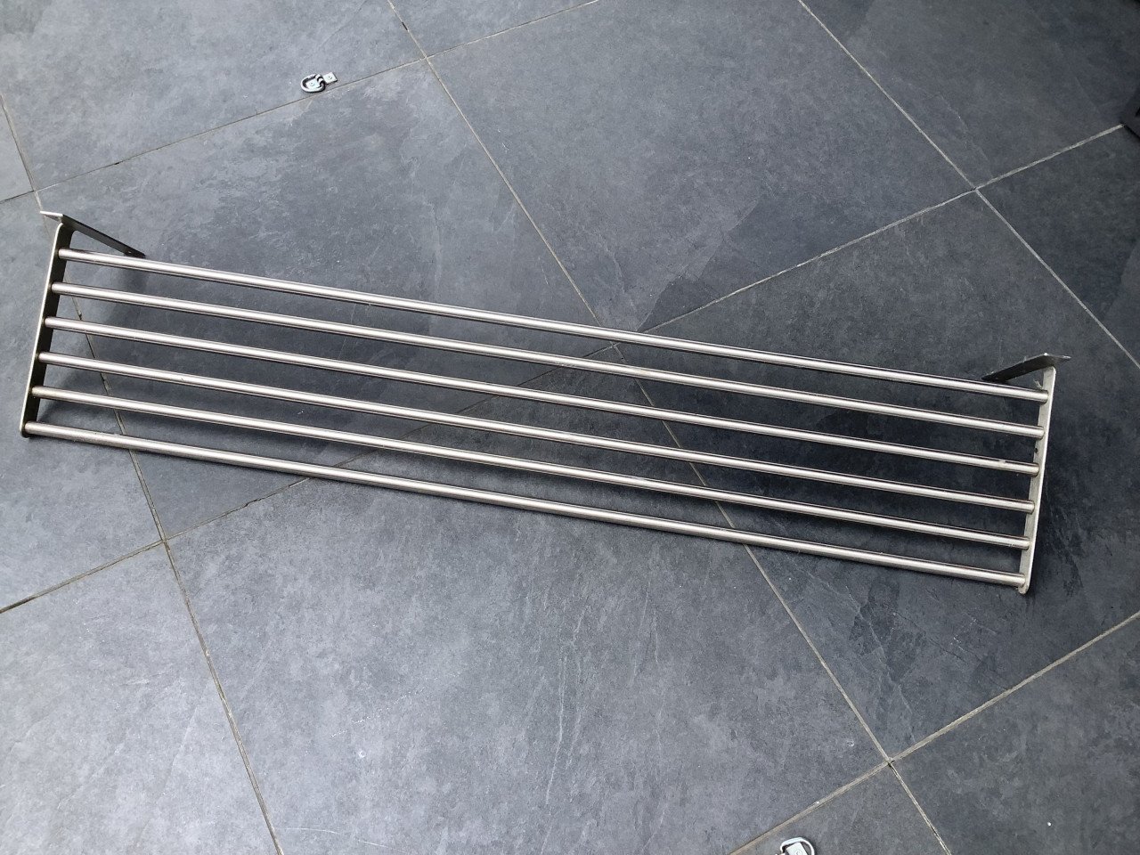RVS pannenrek, ca.120 cm breed. Ook om keukengerei aan te hangen.