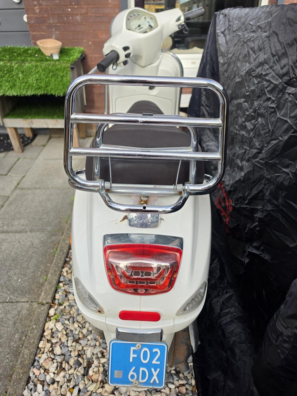 Vespa LX50 blauw kenteken