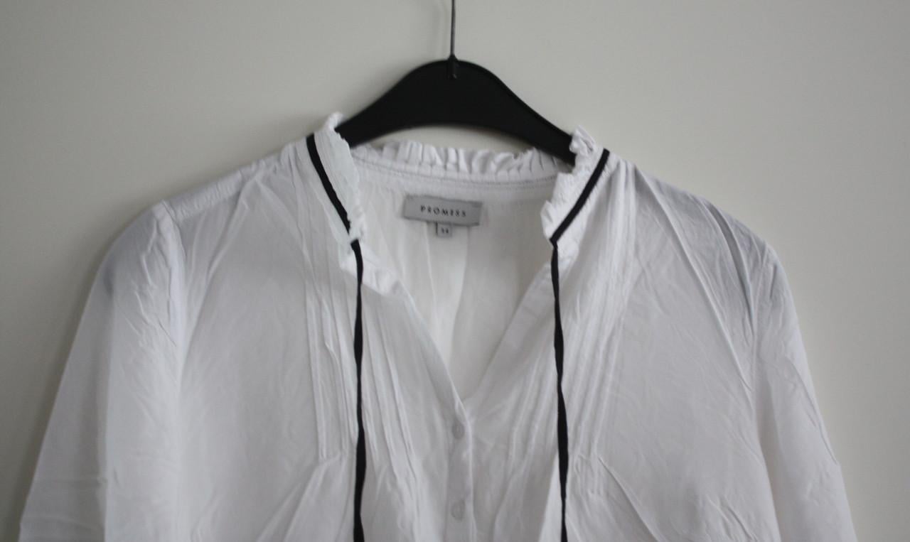 Witte blouse met zwarte toutjes  maat 34