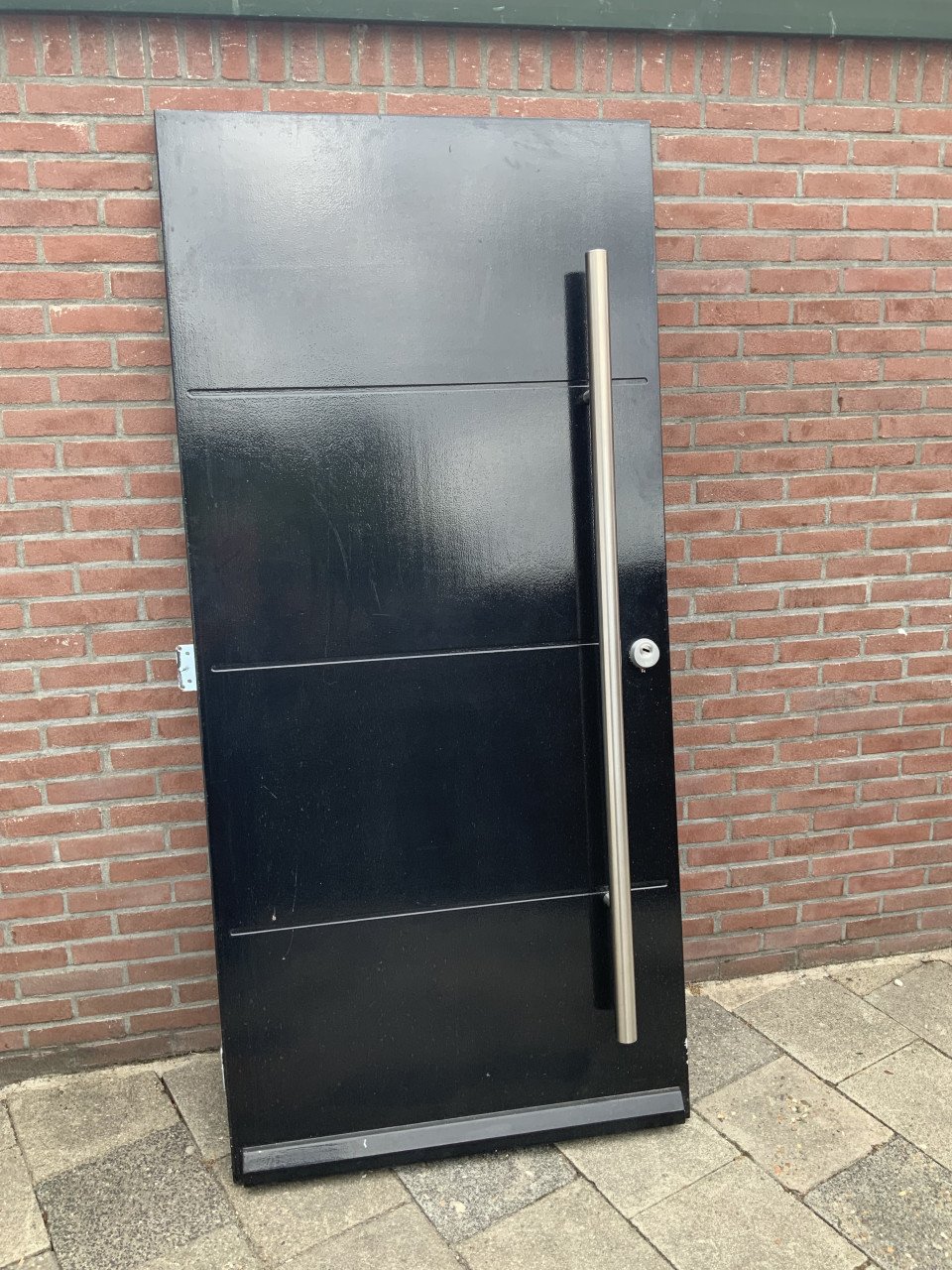 Dichten voordeur met rvs deurgreep