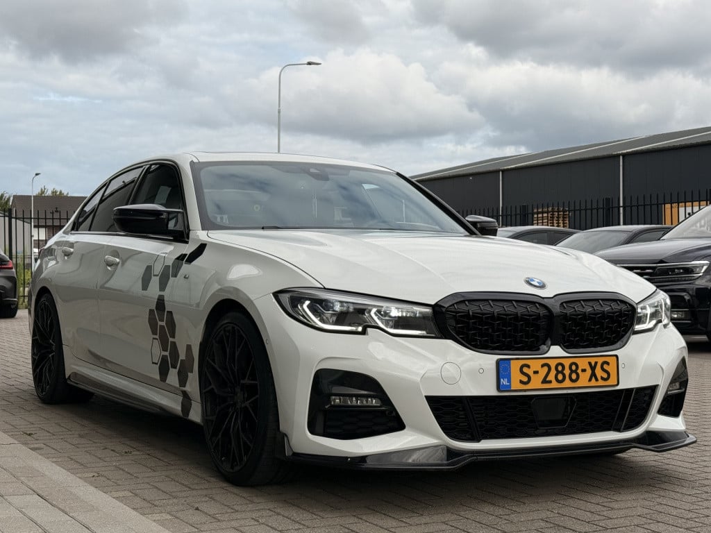 BMW 3-serie 320i m-sport | schuifdak | acc | leder | memory | laser | 20 in