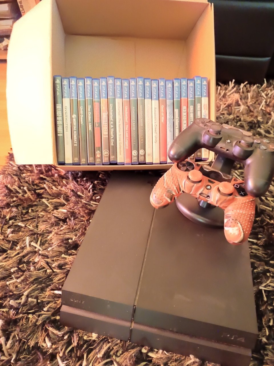 Playstation 4 1TB met 21 spellen en controller
