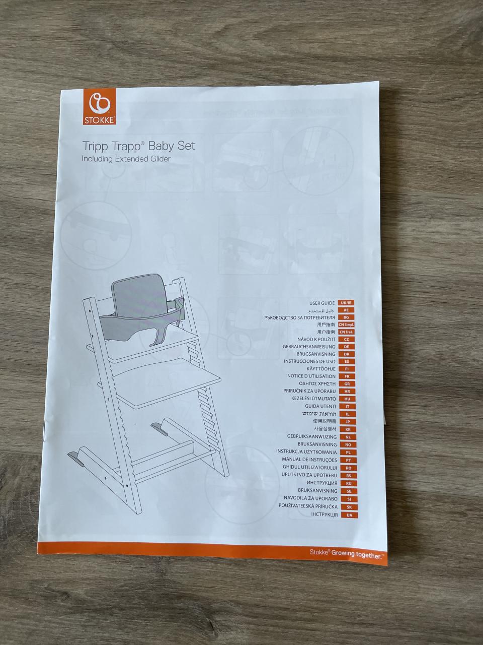 Zwarte Tripp Trapp stoel met babyset