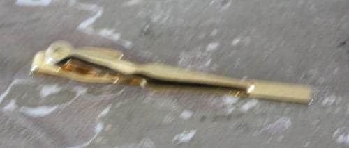 Goudkleurige dasspeld nr2
