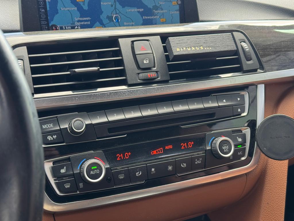 BMW 4 Serie cabrio 428i high executive * nl auto nap * stoel + nek verwarmi