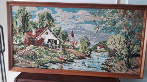 Geborduurd landschap