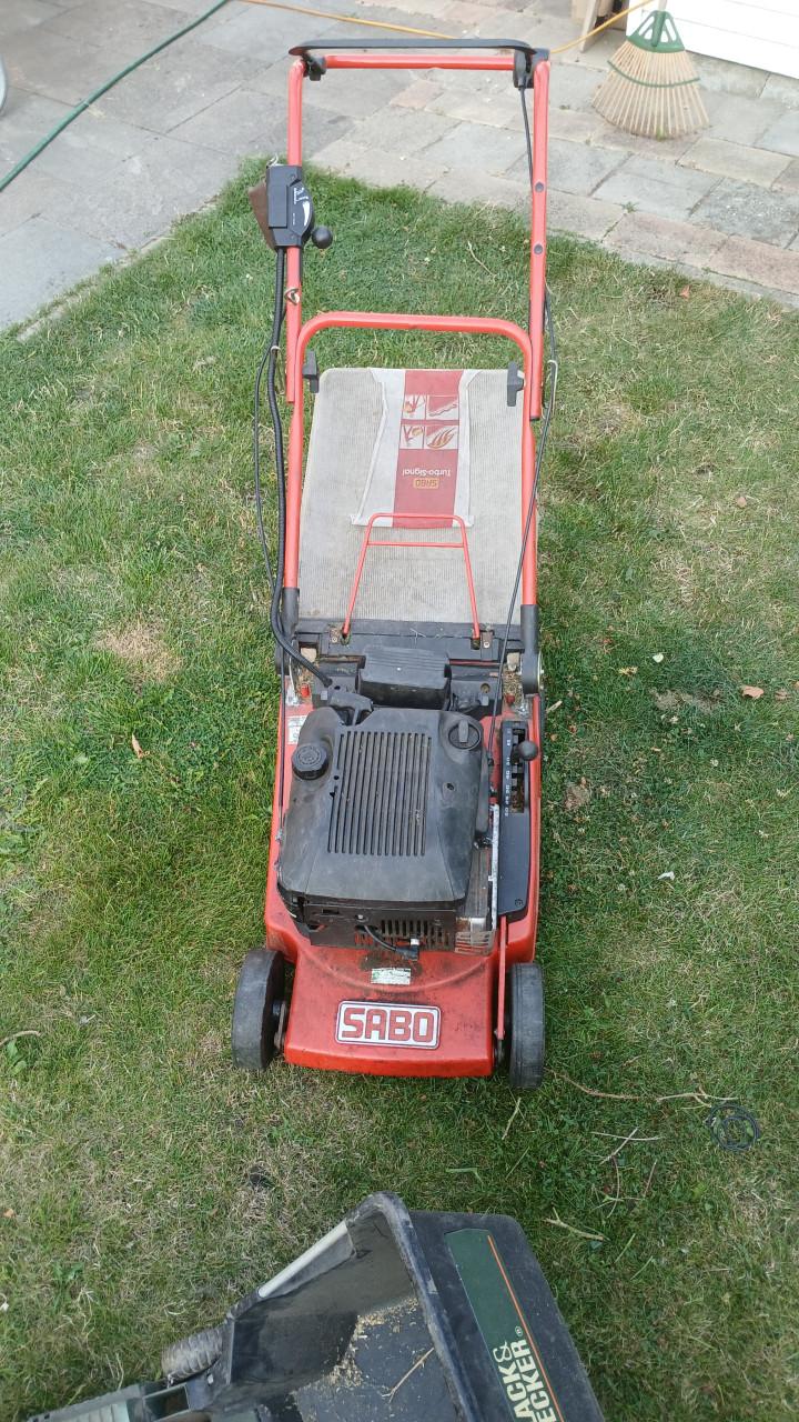 Grasmaaier en verticuteermachine