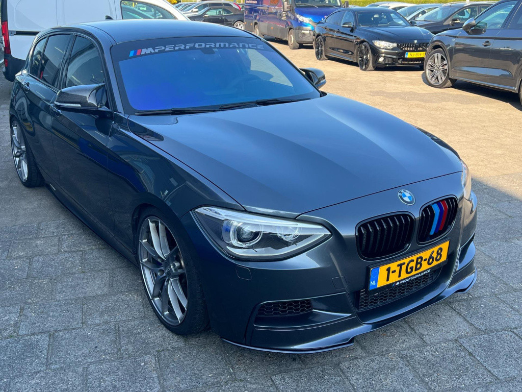 BMW 1 Serie m135i xdrive high executive, customized, stage 2 437 pk!