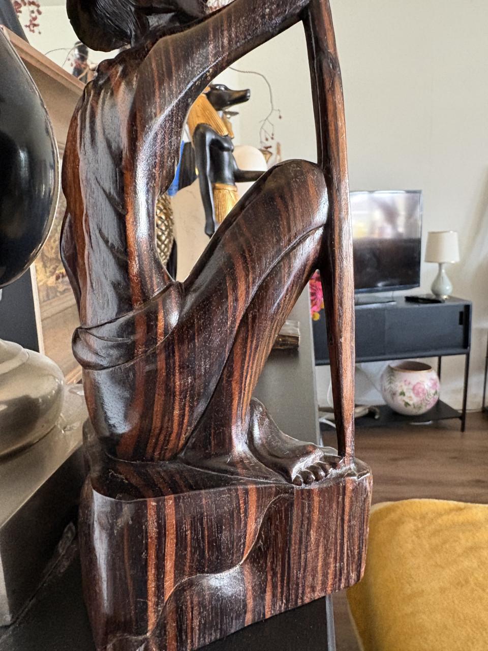 Houten beeldje uit Bali , Indonesie