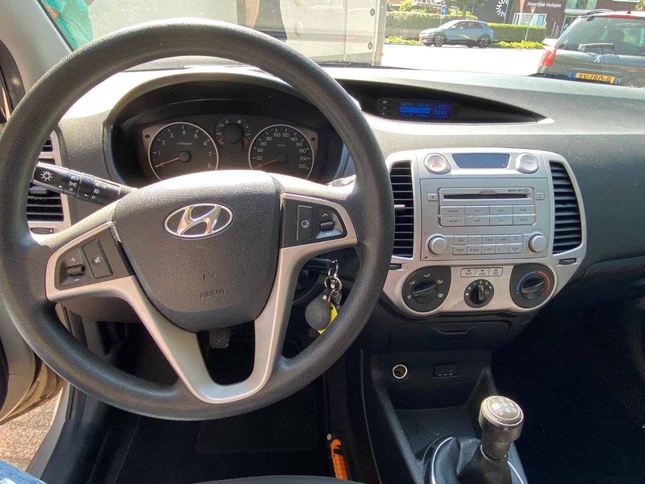 🚗 Hyundai i20 1.2i i-Motion | 52.370km! | Trekhaak | Airco | apk +garantie