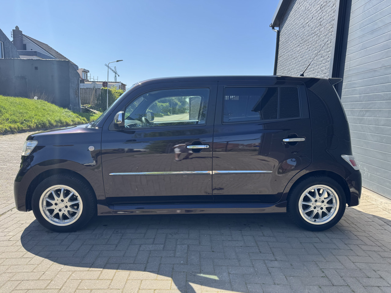 Daihatsu Materia 1.5 2007 76kW 5Drs Rood Airco Apk Nap