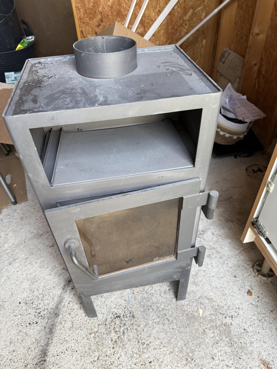 Dik Geurts houtkachel + Dubbelwandige RVS kachelpijpen