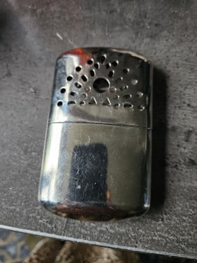 Leuke vintage Jon-E-handwarmer, vlamloos apparaat voor warme handen