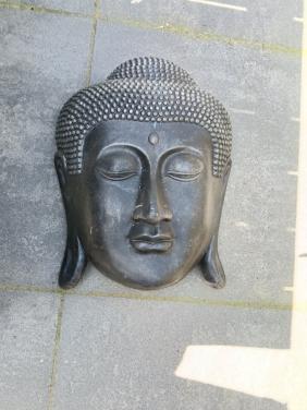Groot zwart boedha hoofd