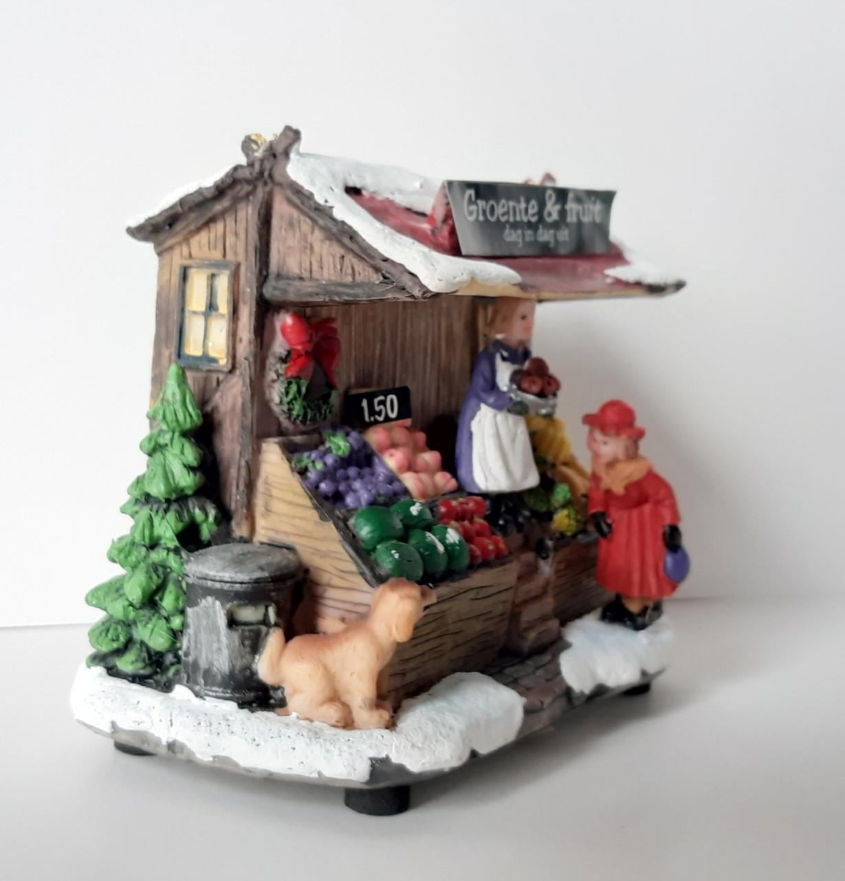 Kersthuisje, kersdecoratie met verlichting, groente & fruitkraam