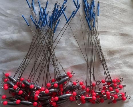 Stalen afhouders in verschillende kleuren.