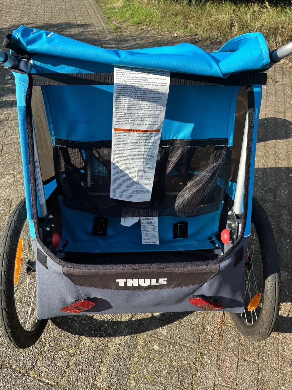 Thule fietskar voor twee kindjes. Ook als wandelwagen te gebruiken.