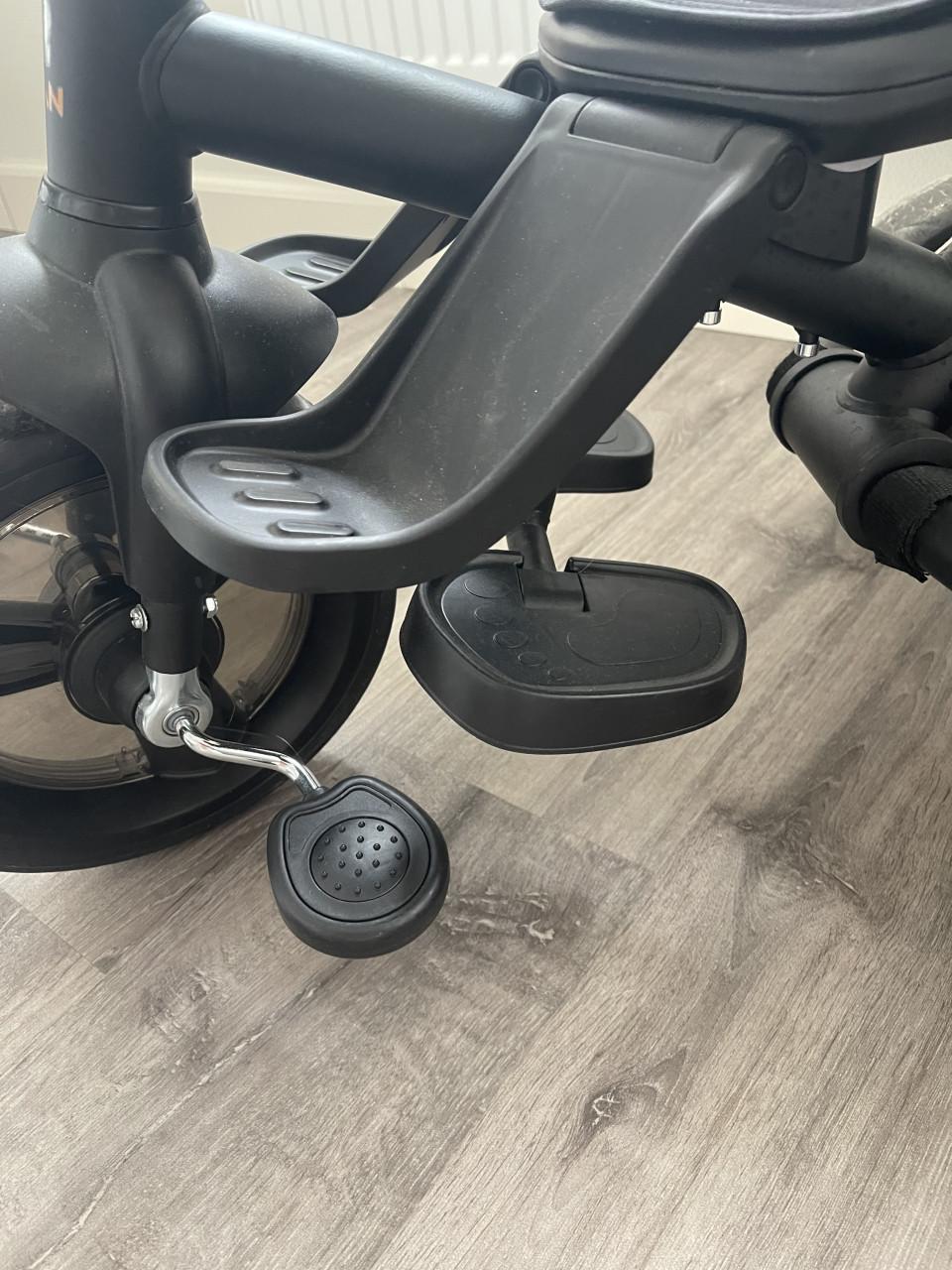 Driewieler met duwstang