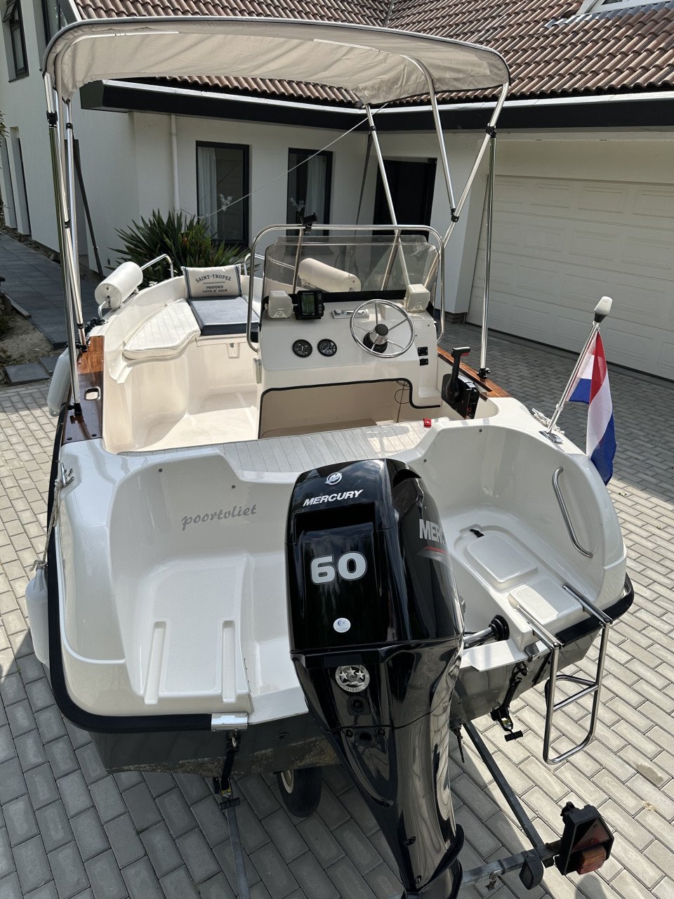 Mooie Elan 15SC met vrijwel nieuwe Mercury 60 pk en Pega trailer