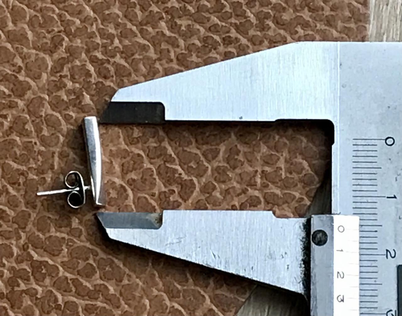 Zilveren ring met oorbellen van goudsmid Renate ritskes