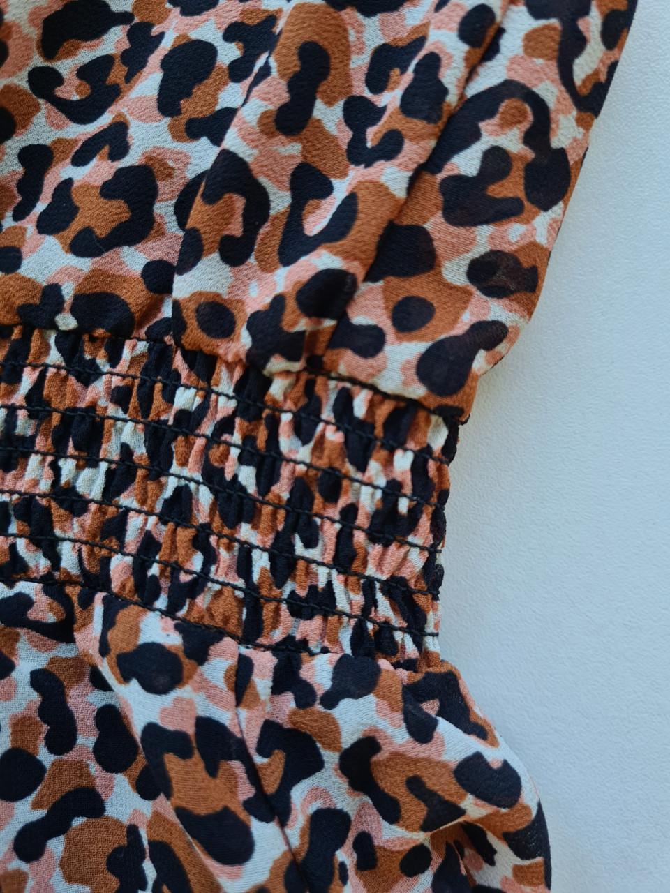 Leuk tijgerprint jurkje van Kids  Mt 128