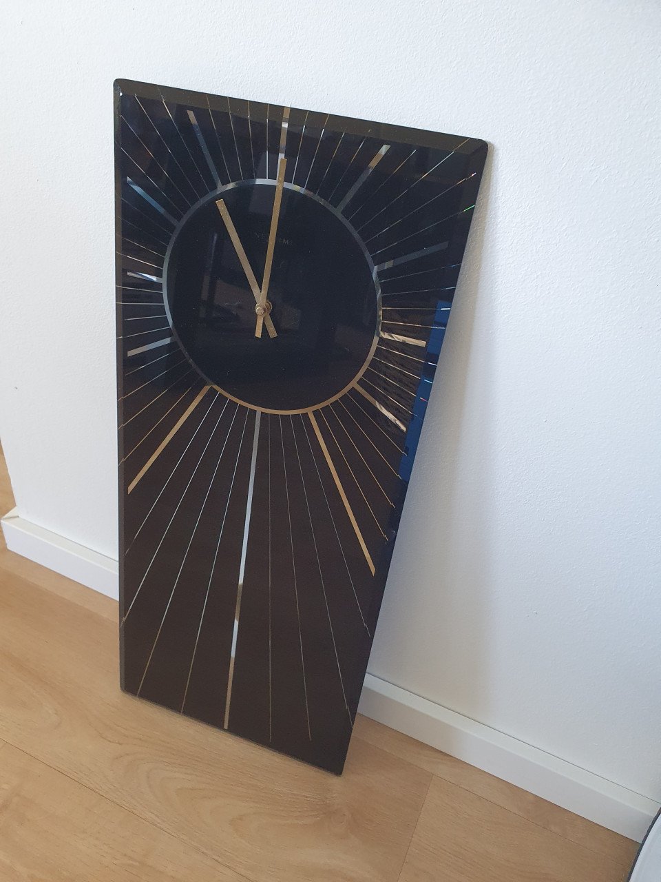 Moderne zwarte glazen klok 70x30 cm