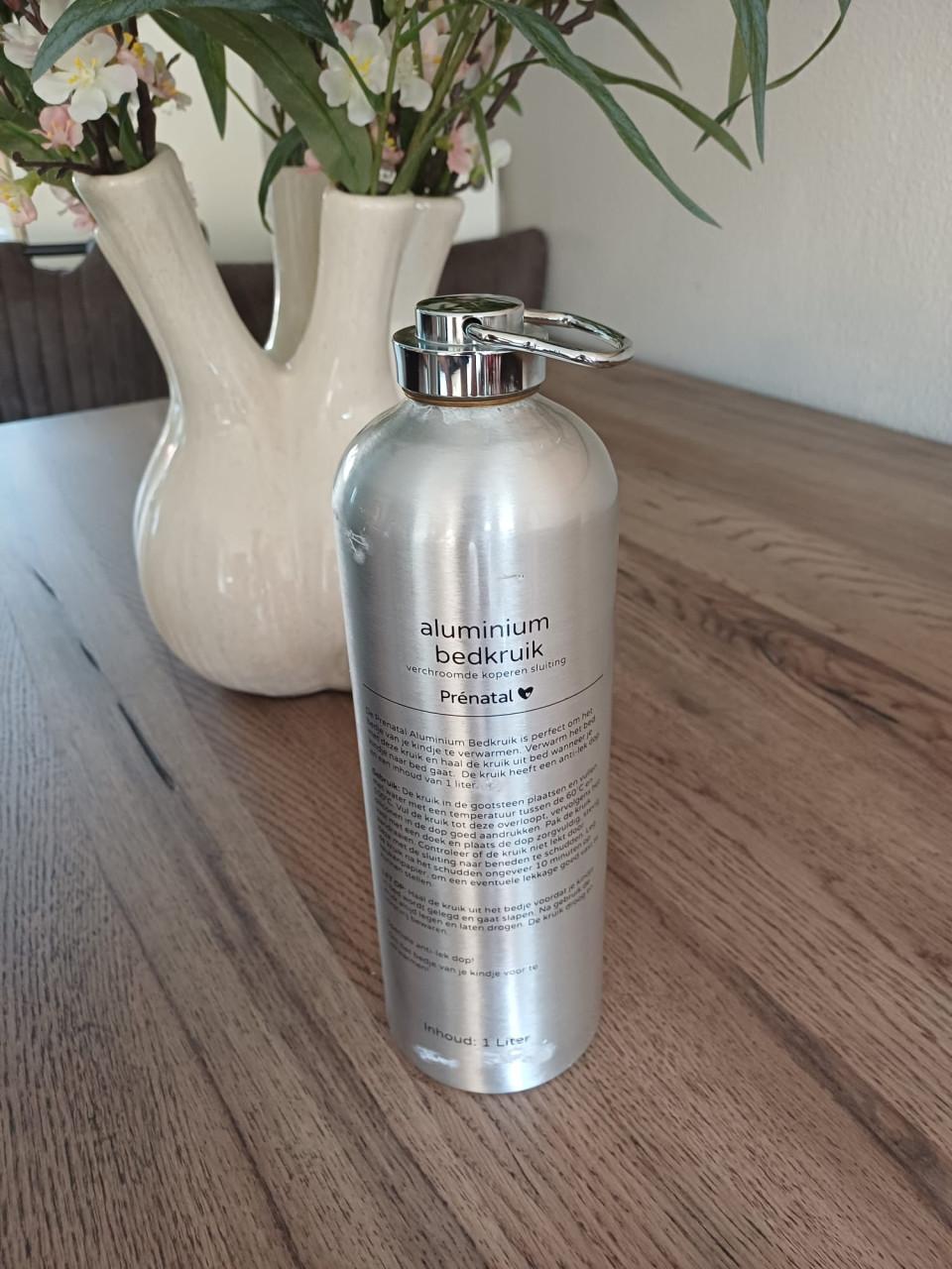 Prénatal aluminium kruik 2x + 2x Prénatal kruikenzak — €10